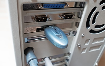 The new/old USB ports and my 64-megabyte flash drive.